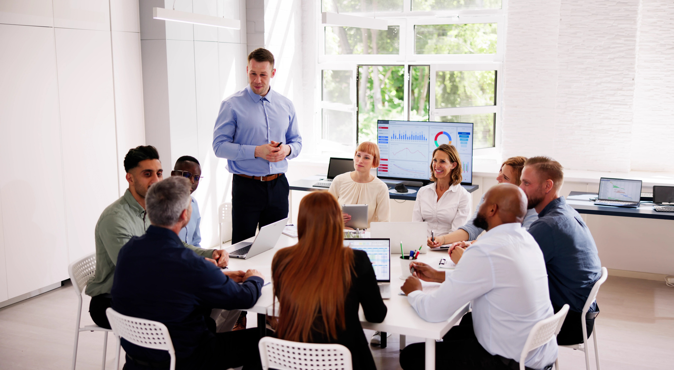 Company Inside Meeting In Office Boardroom